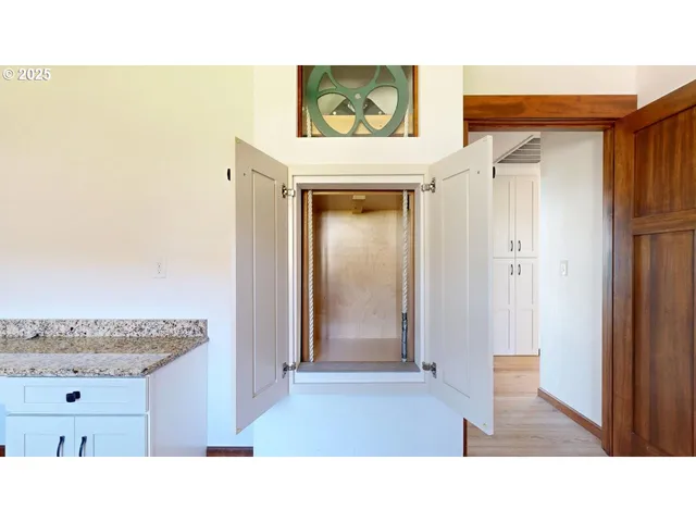 a bathroom with a sink a mirror and a shower