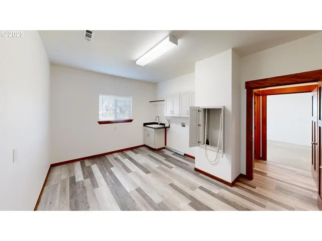 a open hall with a painting