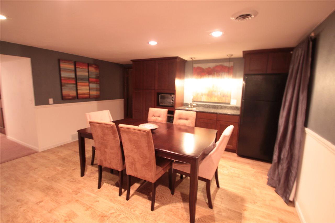 1138 Roxbury Road Rockford, IL 61107 - Photo 20 of 25 a view of a dining room with furniture window and outside view