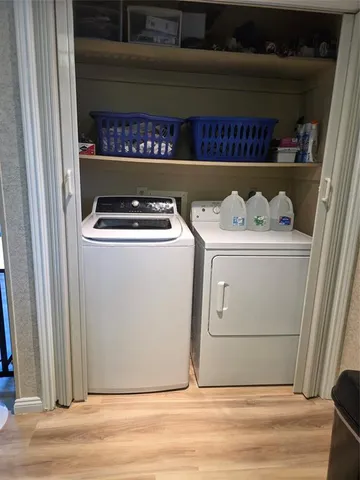 a utility room with washer and dryer