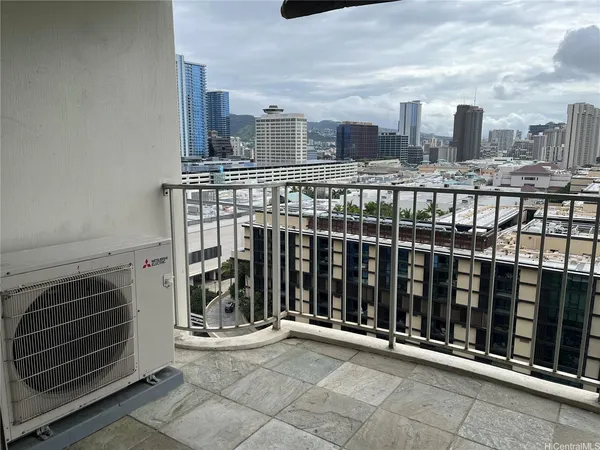 a view of a balcony with an outdoor space