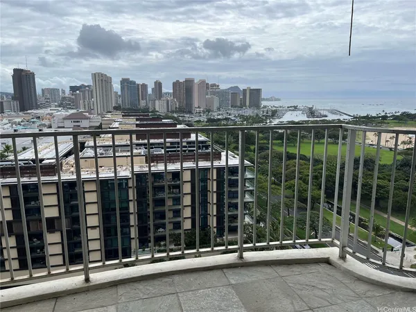 a view of a balcony with city view