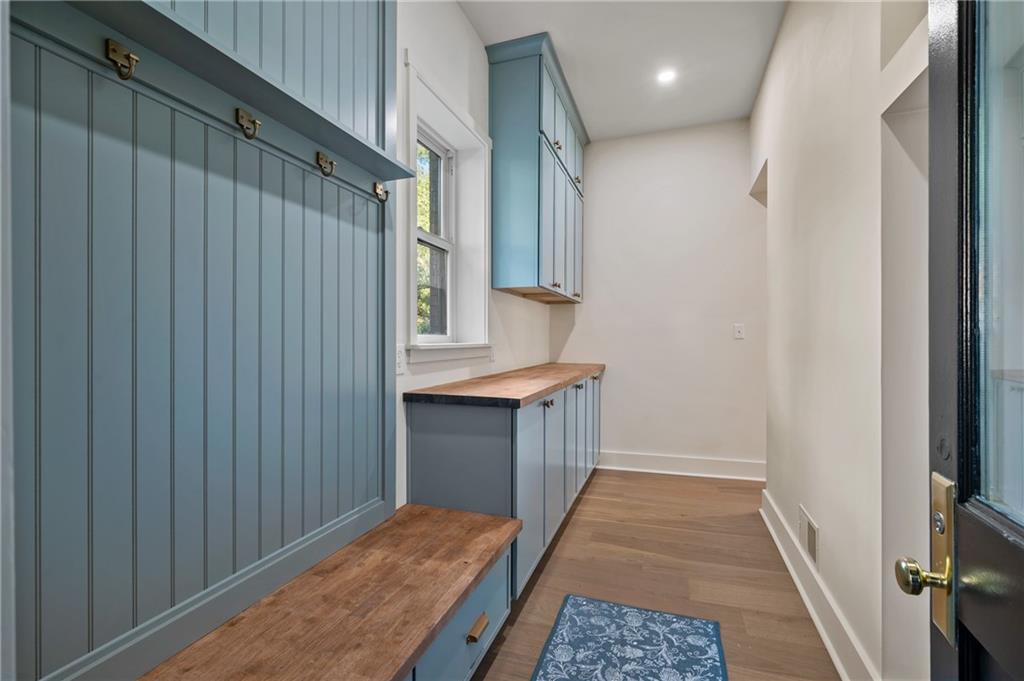 5563 Hampton Street Pittsburgh, PA 15206 - Photo 16 of 29 a bathroom with a sink and a mirror