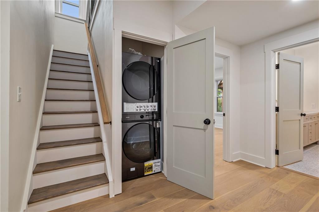 5563 Hampton Street Pittsburgh, PA 15206 - Photo 27 of 29 a view of a hallway with wooden floor and entryway