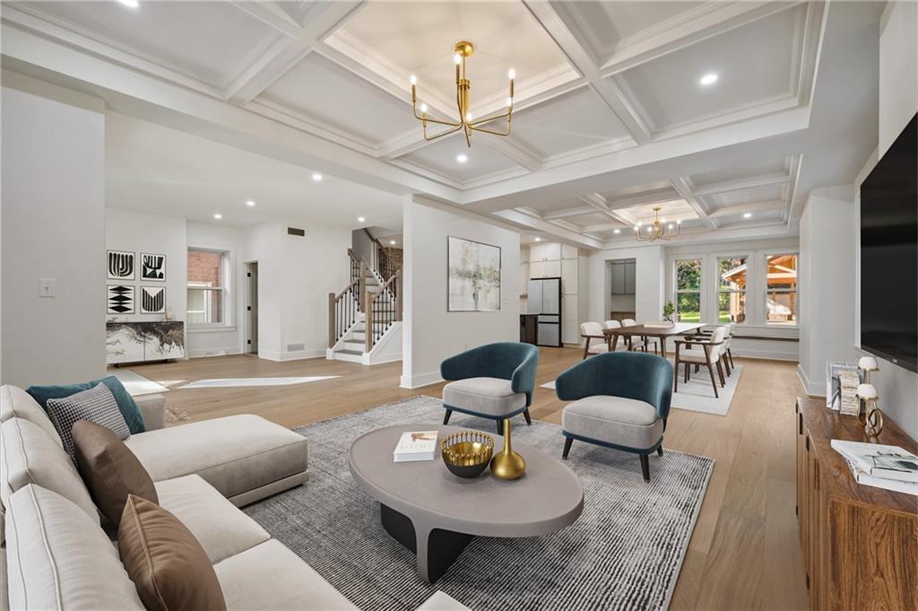 5563 Hampton Street Pittsburgh, PA 15206 - Photo 10 of 29 a living room with furniture and a flat screen tv