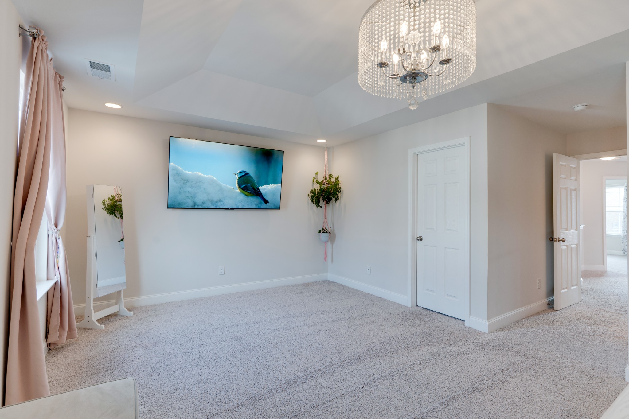 420 Longstone Road Gallatin, TN 37066 - Photo 11 of 24 en empty room with windows and chandelier