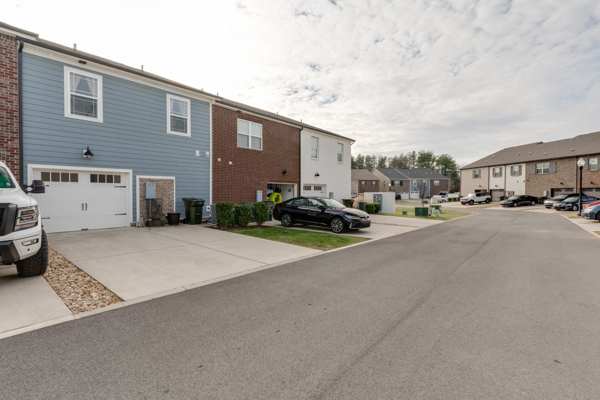 420 Longstone Road Gallatin, TN 37066 - Photo 18 of 24 a city view with tall buildings and cars parked in front of it