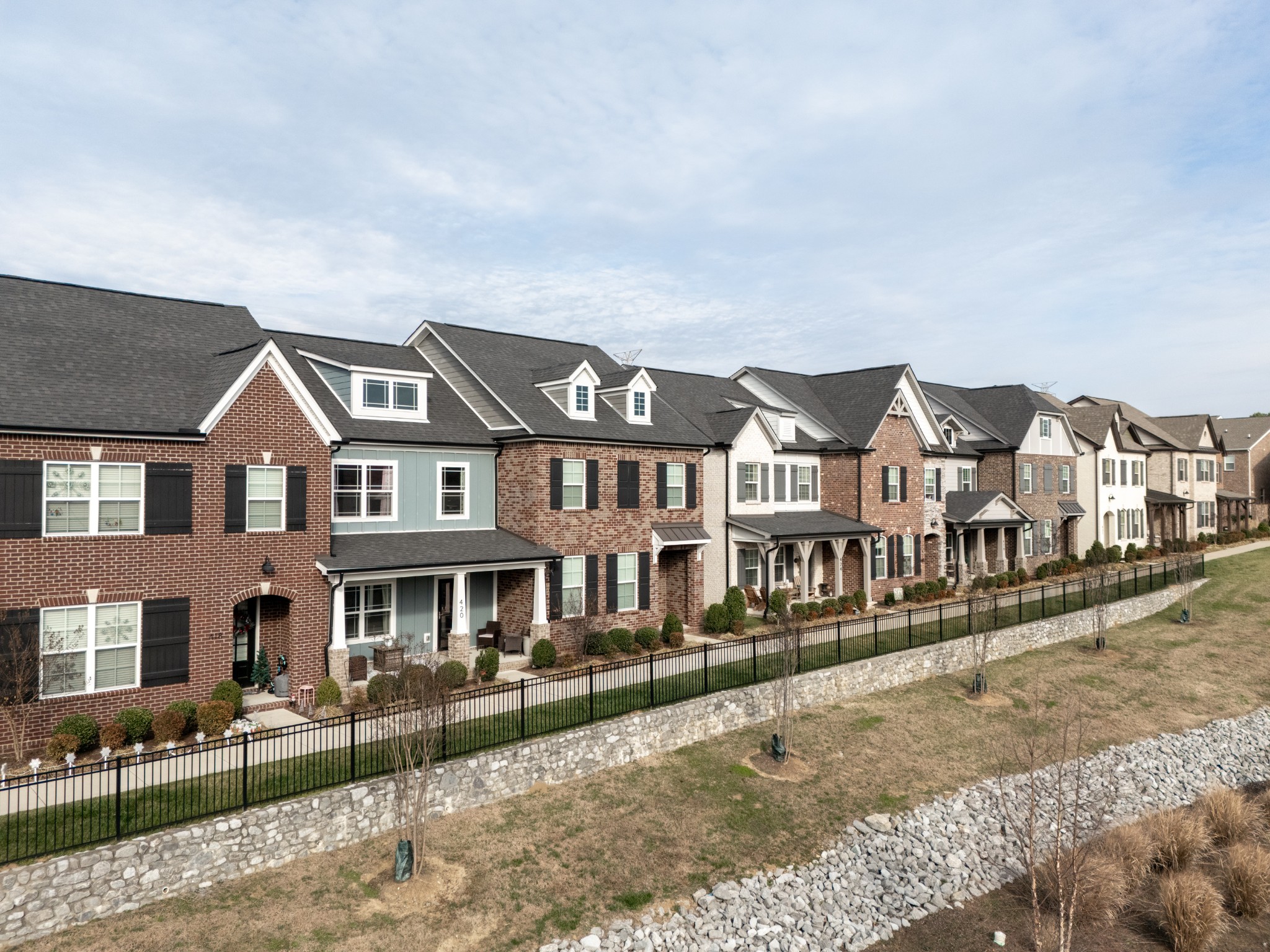 420 Longstone Road Gallatin, TN 37066 - Photo 2 of 24 a front view of a residential apartment building with a yard