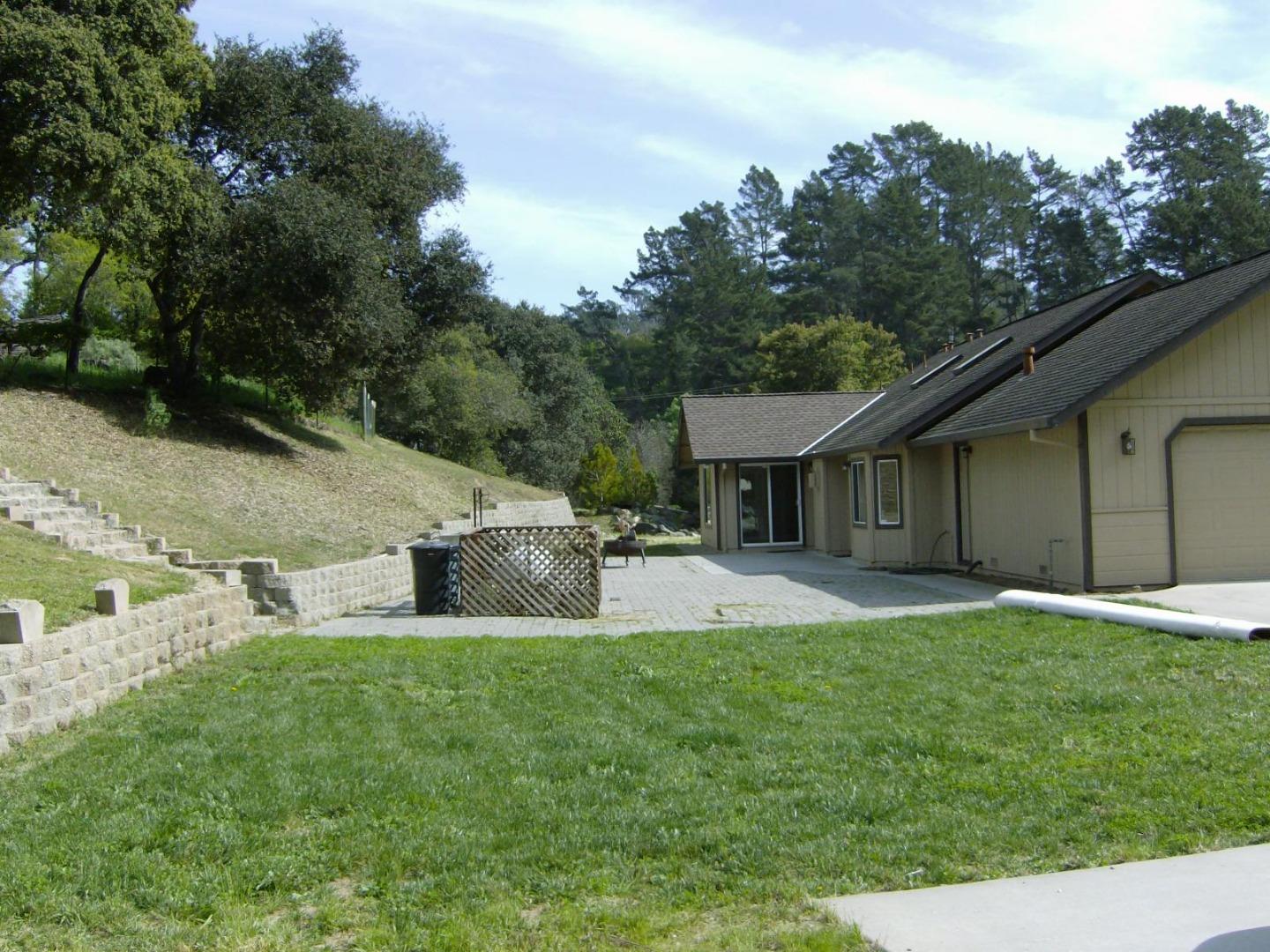 821 Lewis Road Watsonville, CA 95076 - Photo 12 of 15 a view of a house with a yard and sitting area