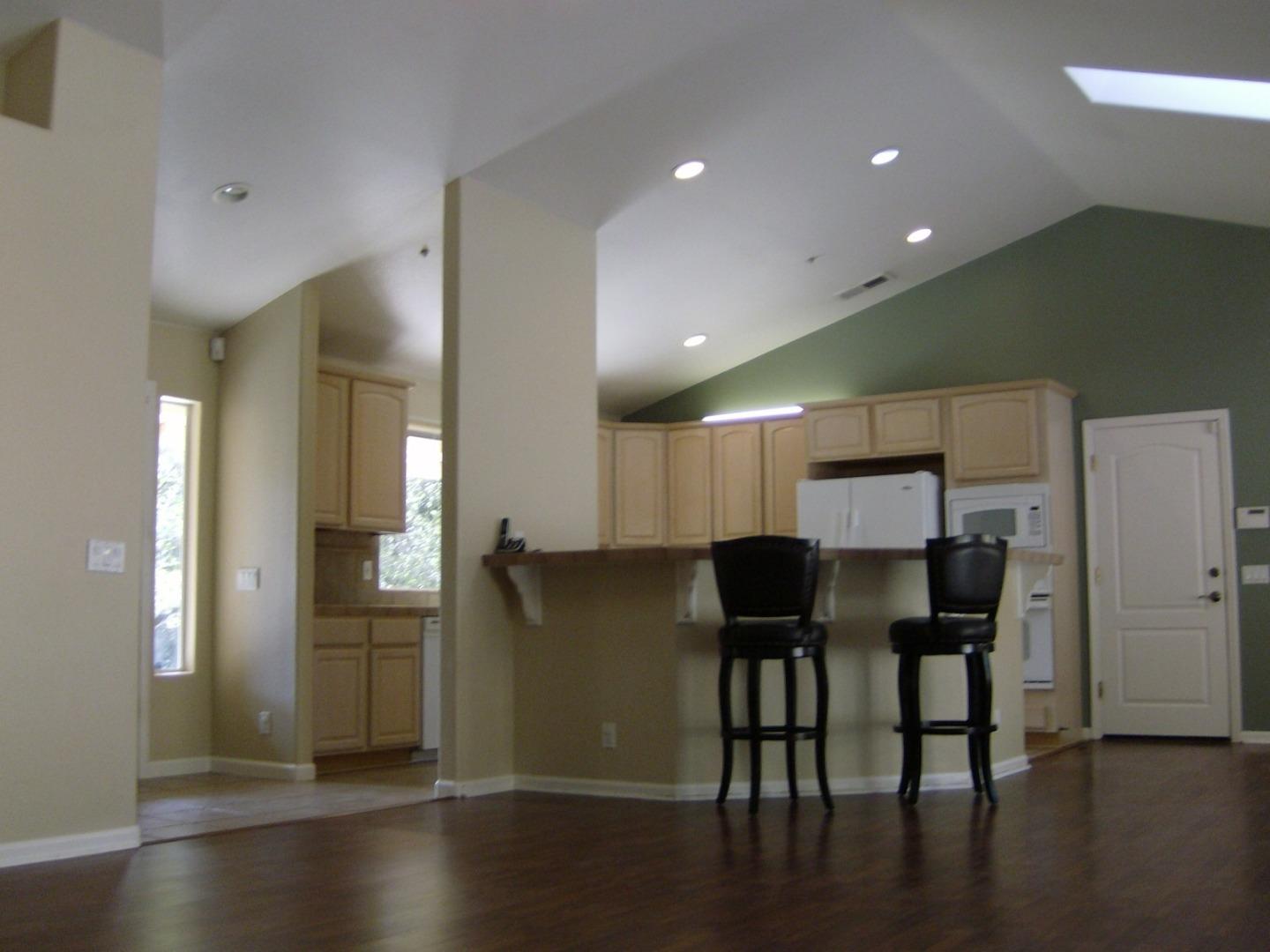 821 Lewis Road Watsonville, CA 95076 - Photo 5 of 15 a view of kitchen with cabinets and wooden floor