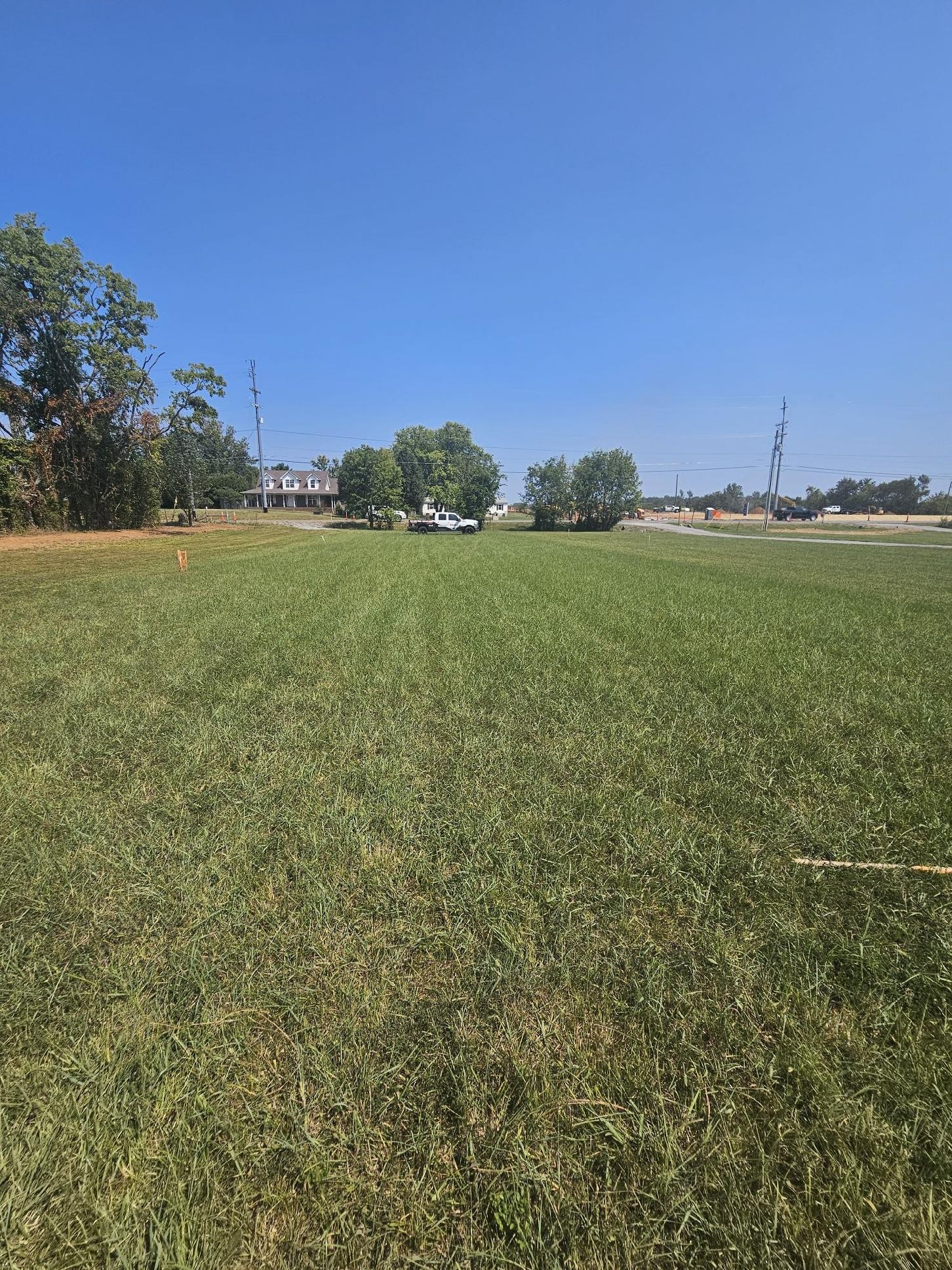 1174 Compton Road Murfreesboro, TN 37130 - Photo 2 of 8 a view of a green field with clear sky