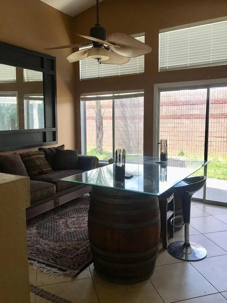 830 Capitola Drive Hollister, CA 95023 - Photo 11 of 14 a living room with furniture and large windows