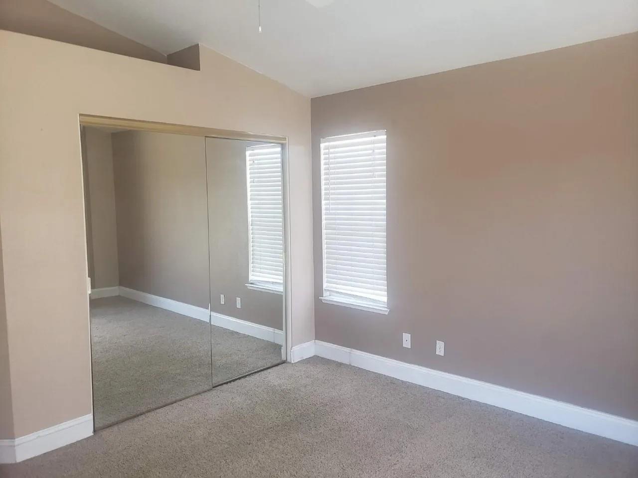830 Capitola Drive Hollister, CA 95023 - Photo 13 of 14 an empty room with windows