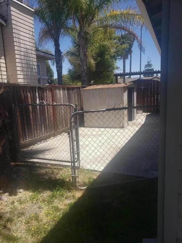 830 Capitola Drive Hollister, CA 95023 - Photo 6 of 14 a view of a back yard of the house