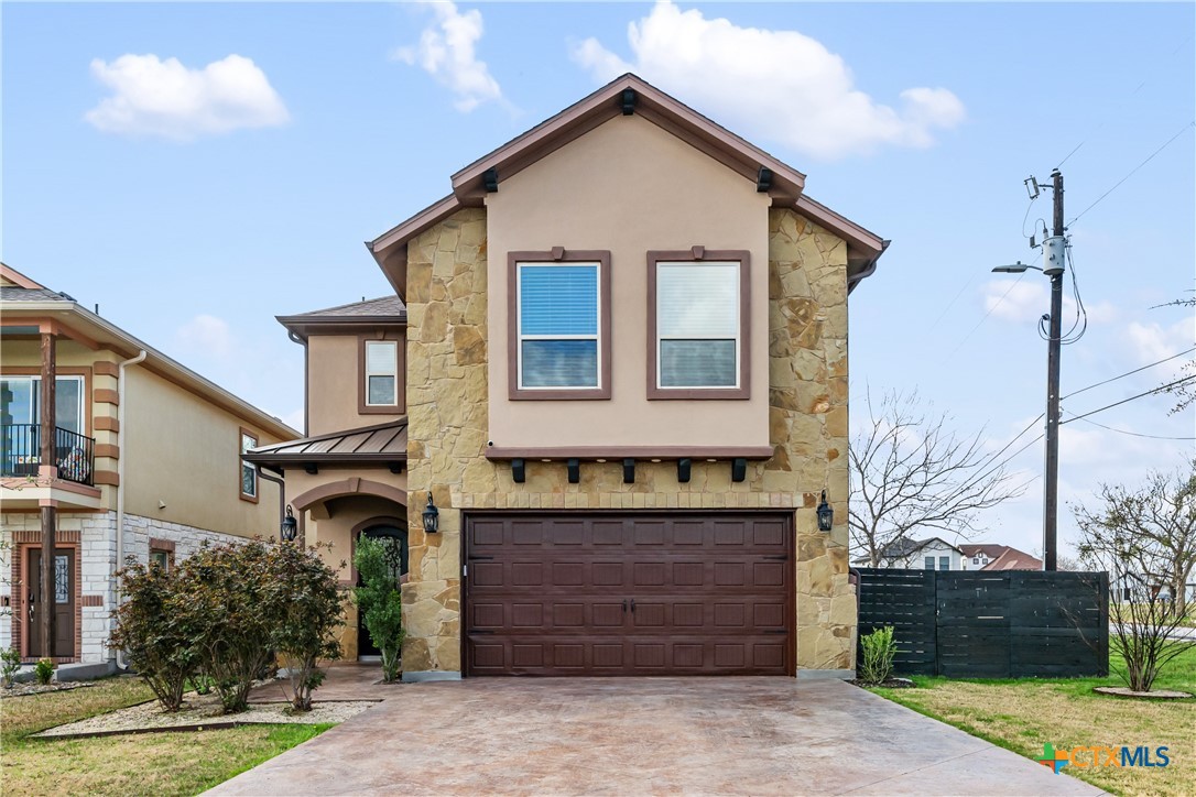 600 Samaripa Street Manor, TX 78653 - Photo 1 of 1 a front view of a house with a yard
