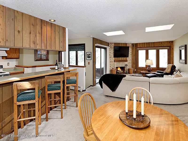 241 Meadow Ranch Road, Unit D2A Snowmass Village, CO 81615 - Photo 1 of 16 Open Living, Dining and Kitchen