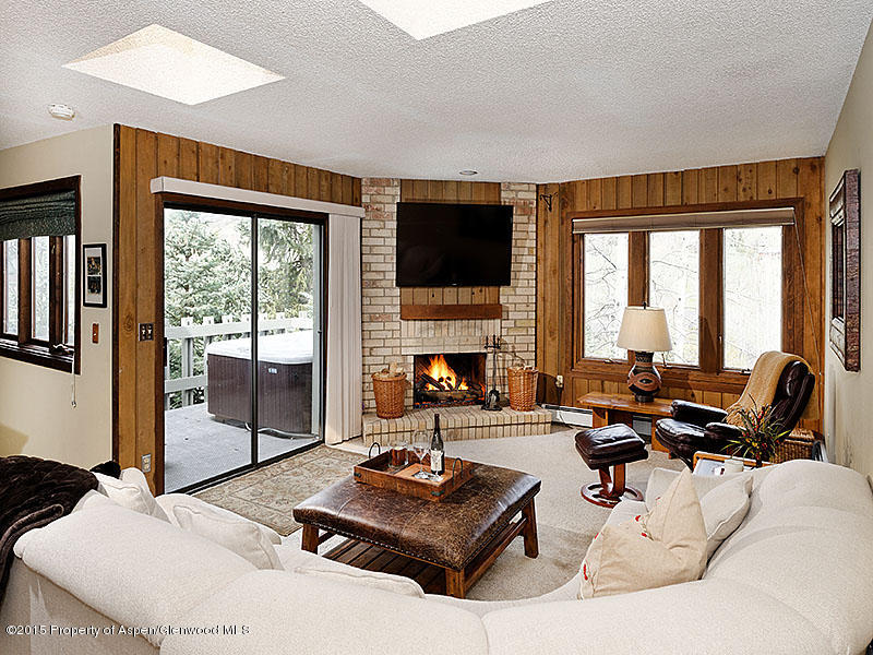 241 Meadow Ranch Road, Unit D2A Snowmass Village, CO 81615 - Photo 2 of 16 Living Room and Deck