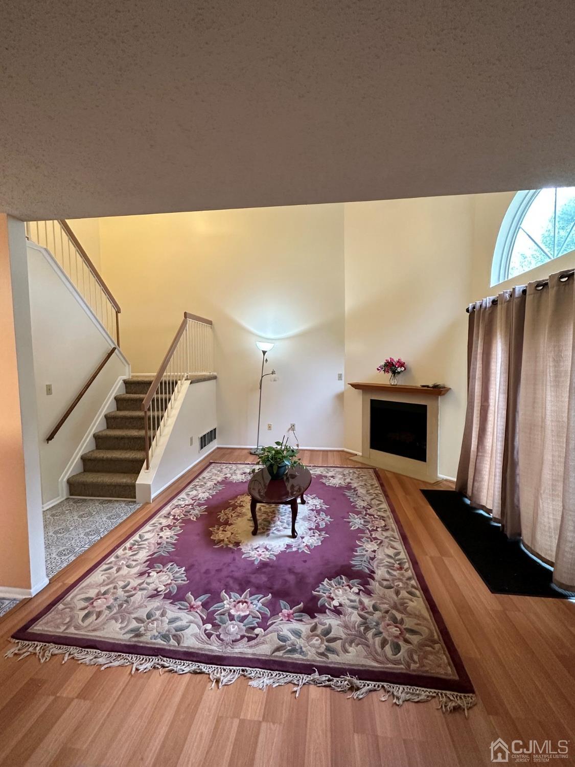 260 Nebula Road Piscataway, NJ 08854 - Photo 12 of 46 a view of a living room and a rug