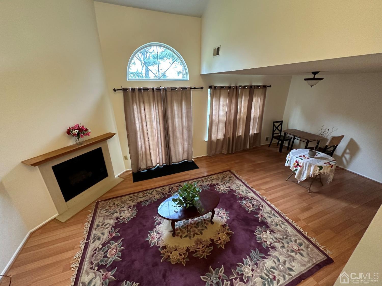 260 Nebula Road Piscataway, NJ 08854 - Photo 17 of 46 a view of a livingroom with furniture and a fireplace