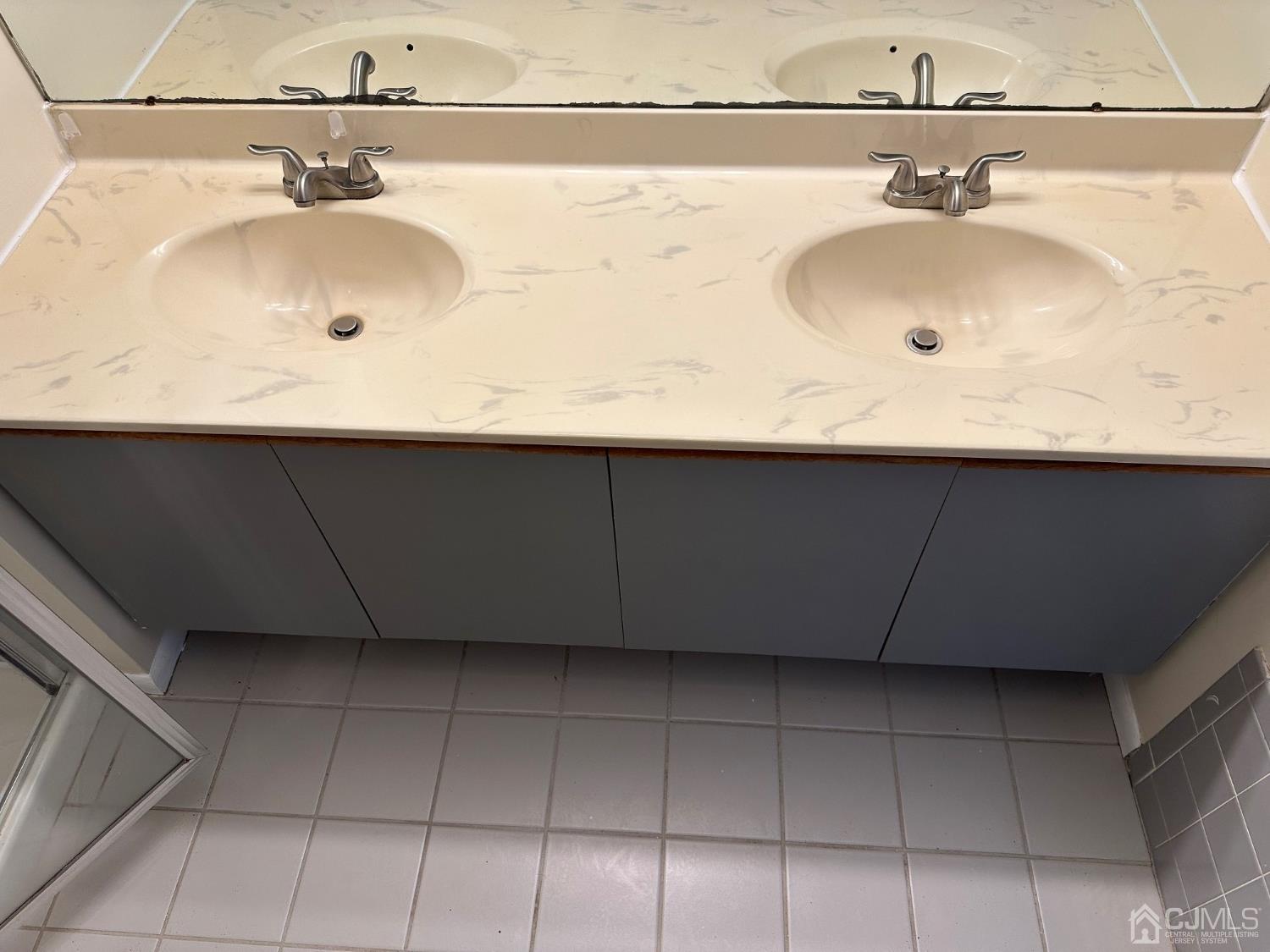 260 Nebula Road Piscataway, NJ 08854 - Photo 34 of 46 a bathroom with a sink and a mirror