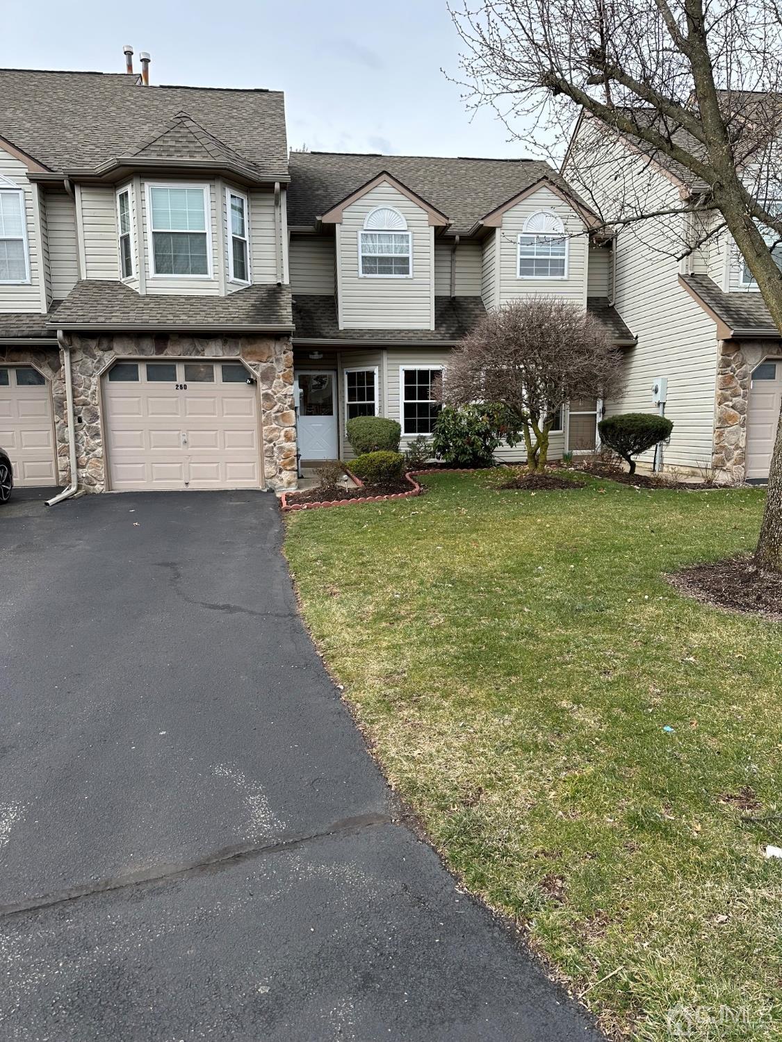 260 Nebula Road Piscataway, NJ 08854 - Photo 42 of 46 a front view of a house with a yard