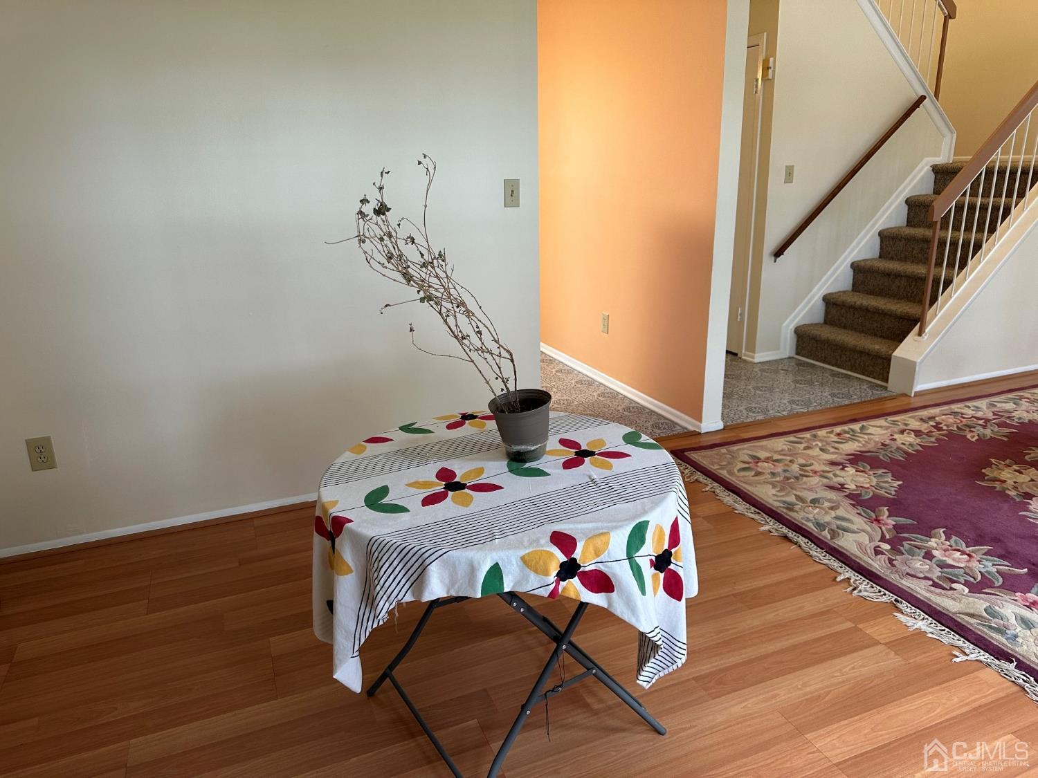 260 Nebula Road Piscataway, NJ 08854 - Photo 8 of 46 a room with furniture and wooden floor