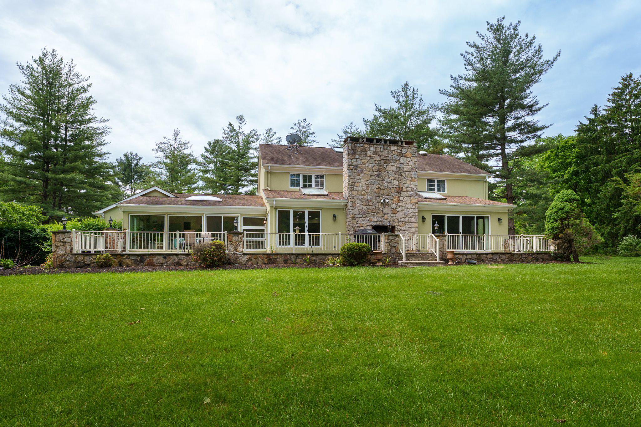 338 Gallup Road Princeton, NJ 08540 - Photo 45 of 53 a front view of a house with a garden