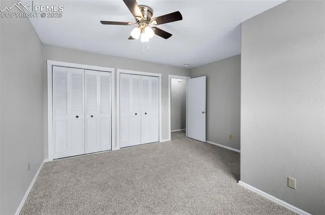 a bathroom with a tub sink toilet and mirror