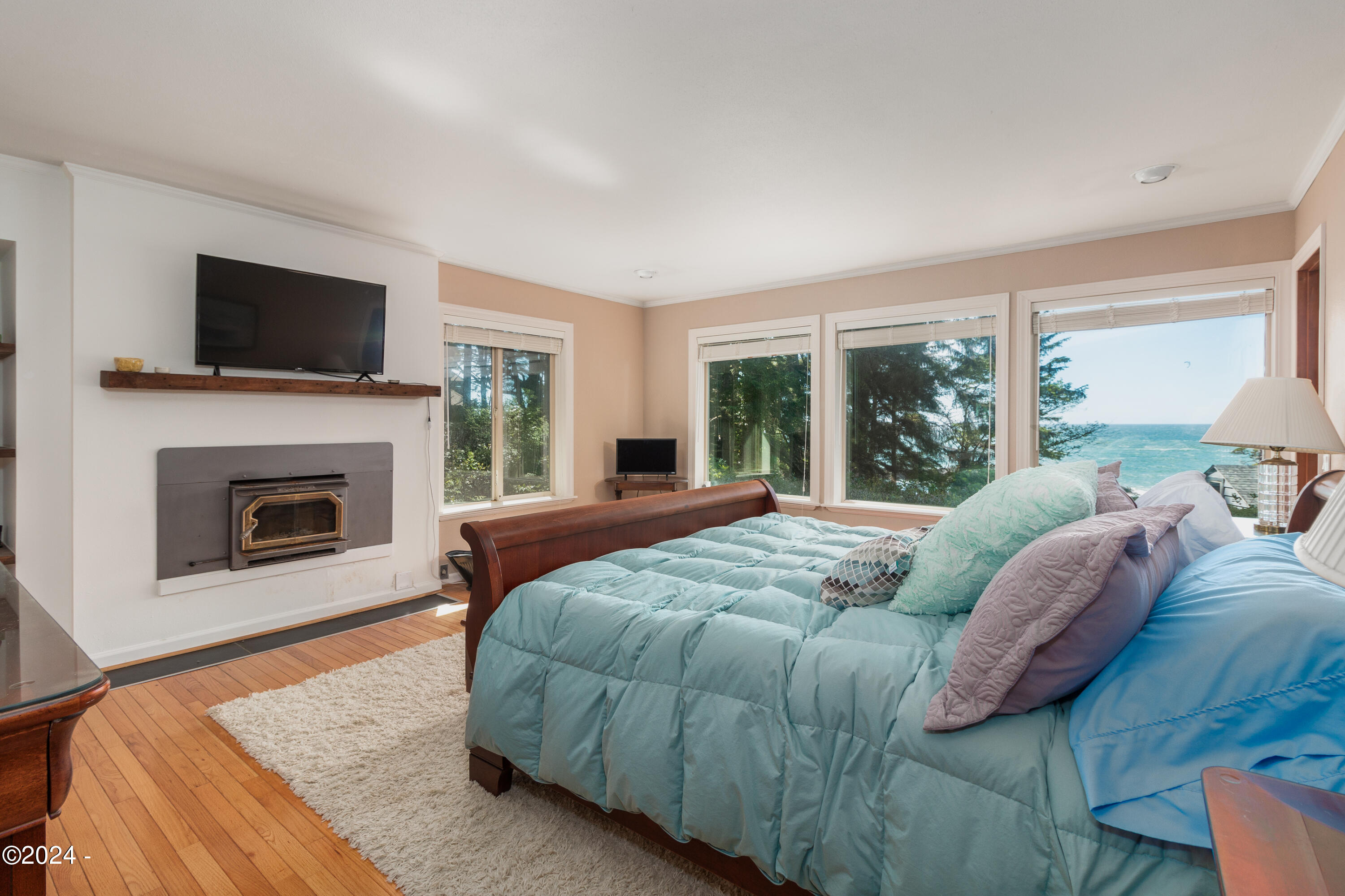 2275 Highway 101 Depoe Bay, OR 97341 - Photo 35 of 61 Bedroom 3 - Primary w/Fireplace