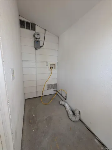 a view of a room with racks on the wall