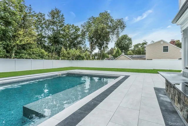 a view of jacuzzi with balcony