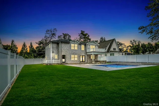 a view of swimming pool with a yard