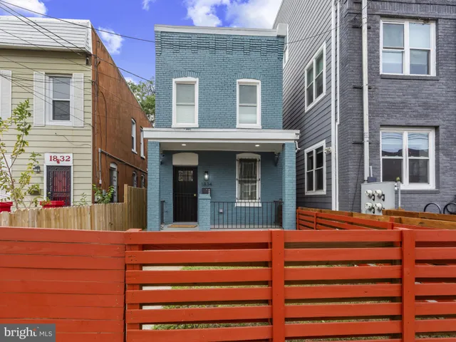 a view of a building with a street