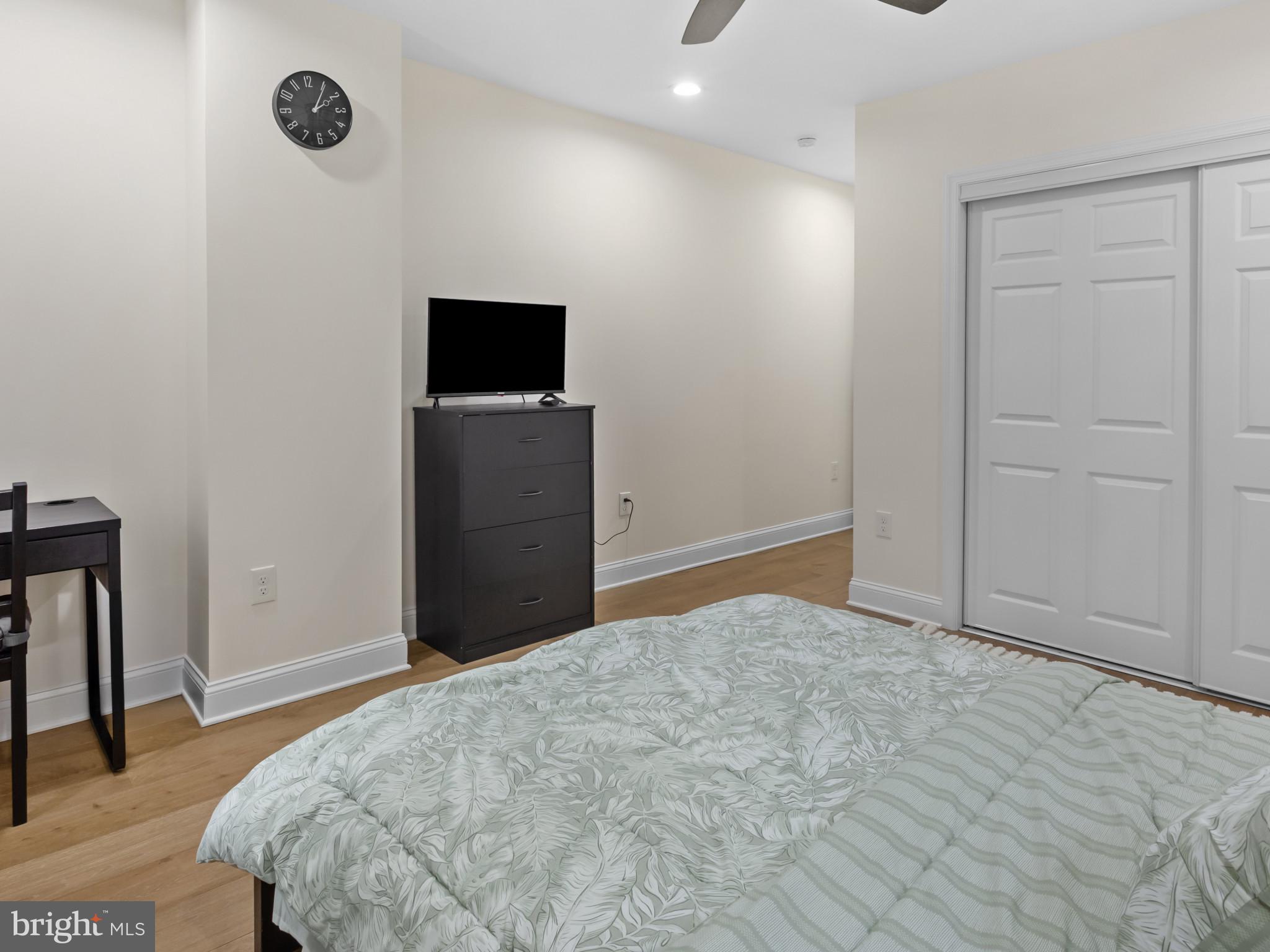 1834 Providence Street Northeast Washington, DC 20002 - Photo 17 of 25 a bedroom with a bed and a window