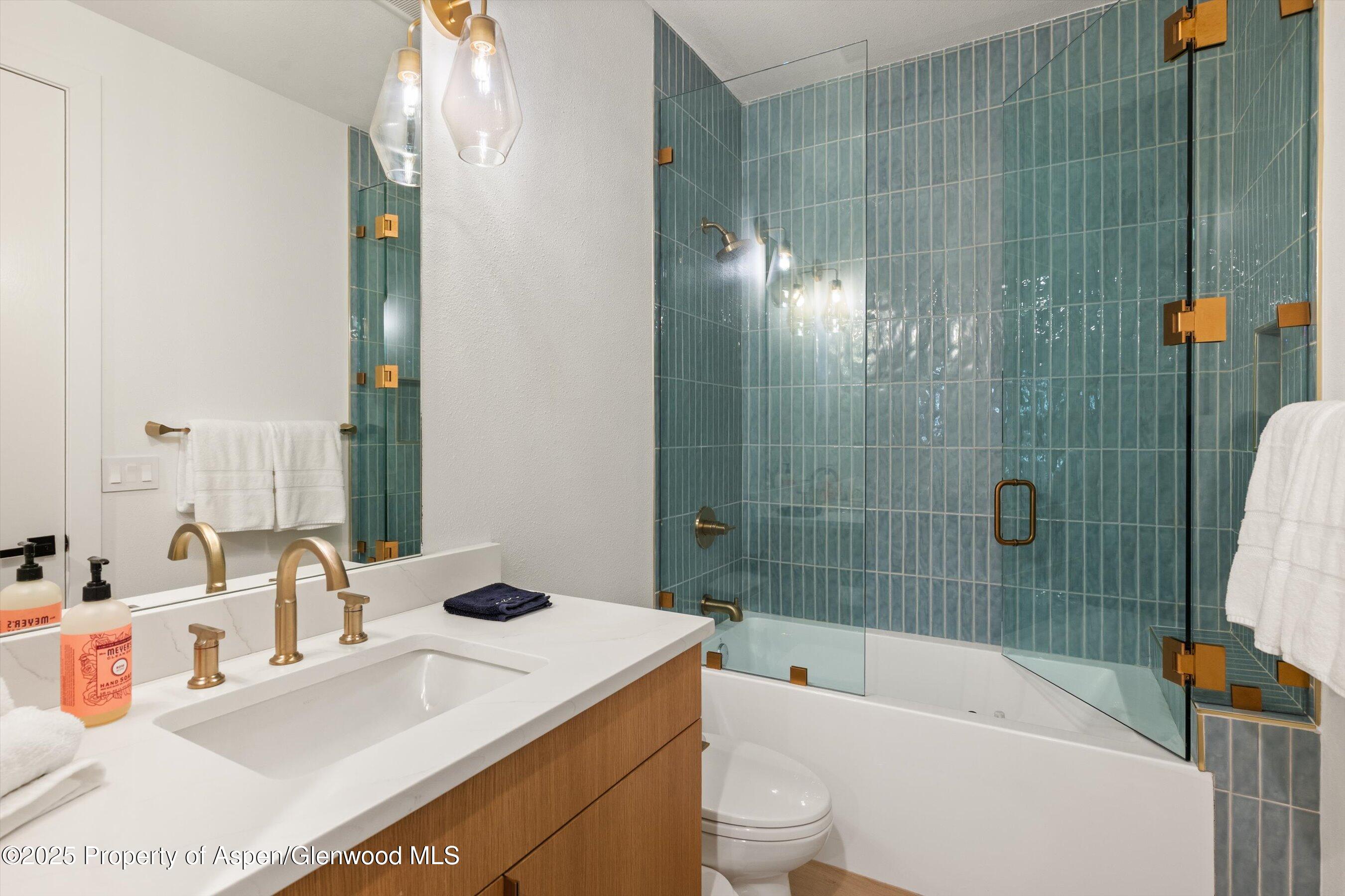 233 Stellar Lane Snowmass Village, CO 81615 - Photo 36 of 43 a bathroom with a sink a toilet and shower