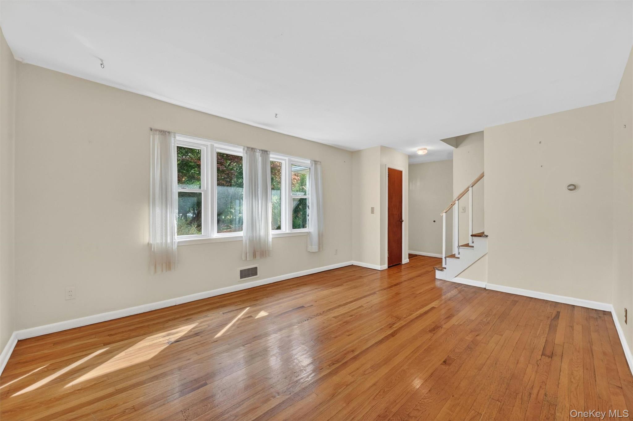 2 Curie Road Cornwall-on-Hudson, NY 12520 - Photo 7 of 37 Living room with stairs to 2nd floor