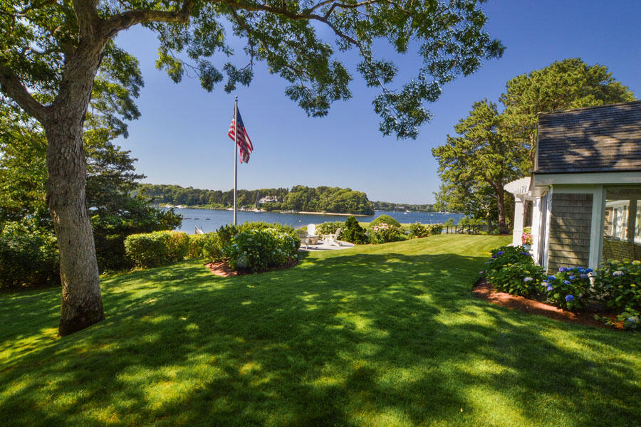 71 Sand Point Osterville, MA 02655 - Photo 42 of 45 a view of a garden with a building in the background
