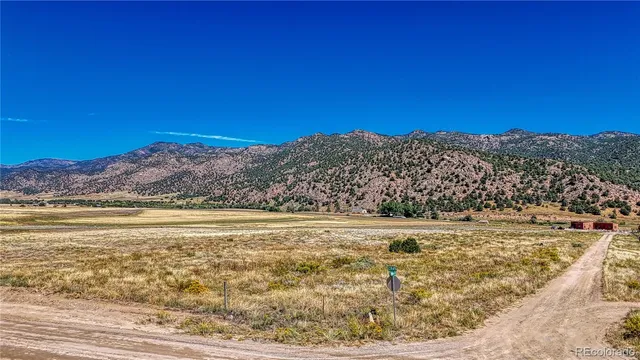 a view of a water an ocean in the background