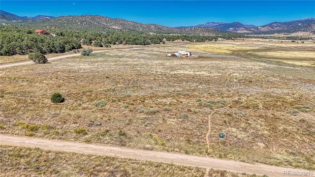 a view of an ocean and a mountain