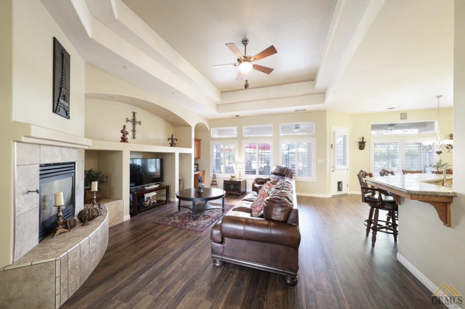Undisclosed Address Bakersfield, CA 93314 - Photo 11 of 31 a living room with furniture and a fireplace