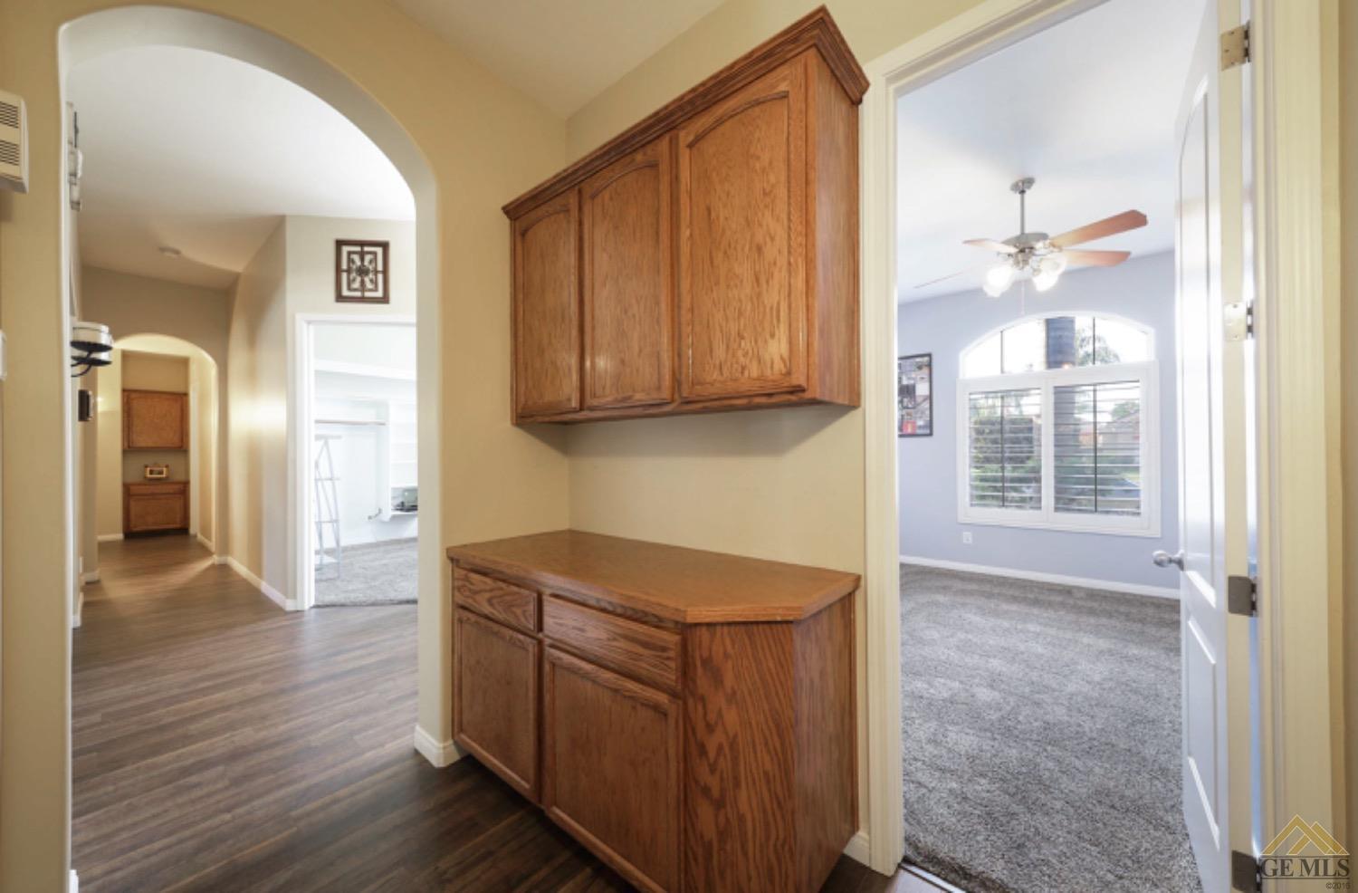 Undisclosed Address Bakersfield, CA 93314 - Photo 19 of 31 a view of hallway with wooden floor