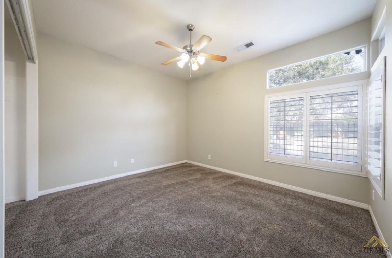 Undisclosed Address Bakersfield, CA 93314 - Photo 24 of 31 a view of an empty room with a window