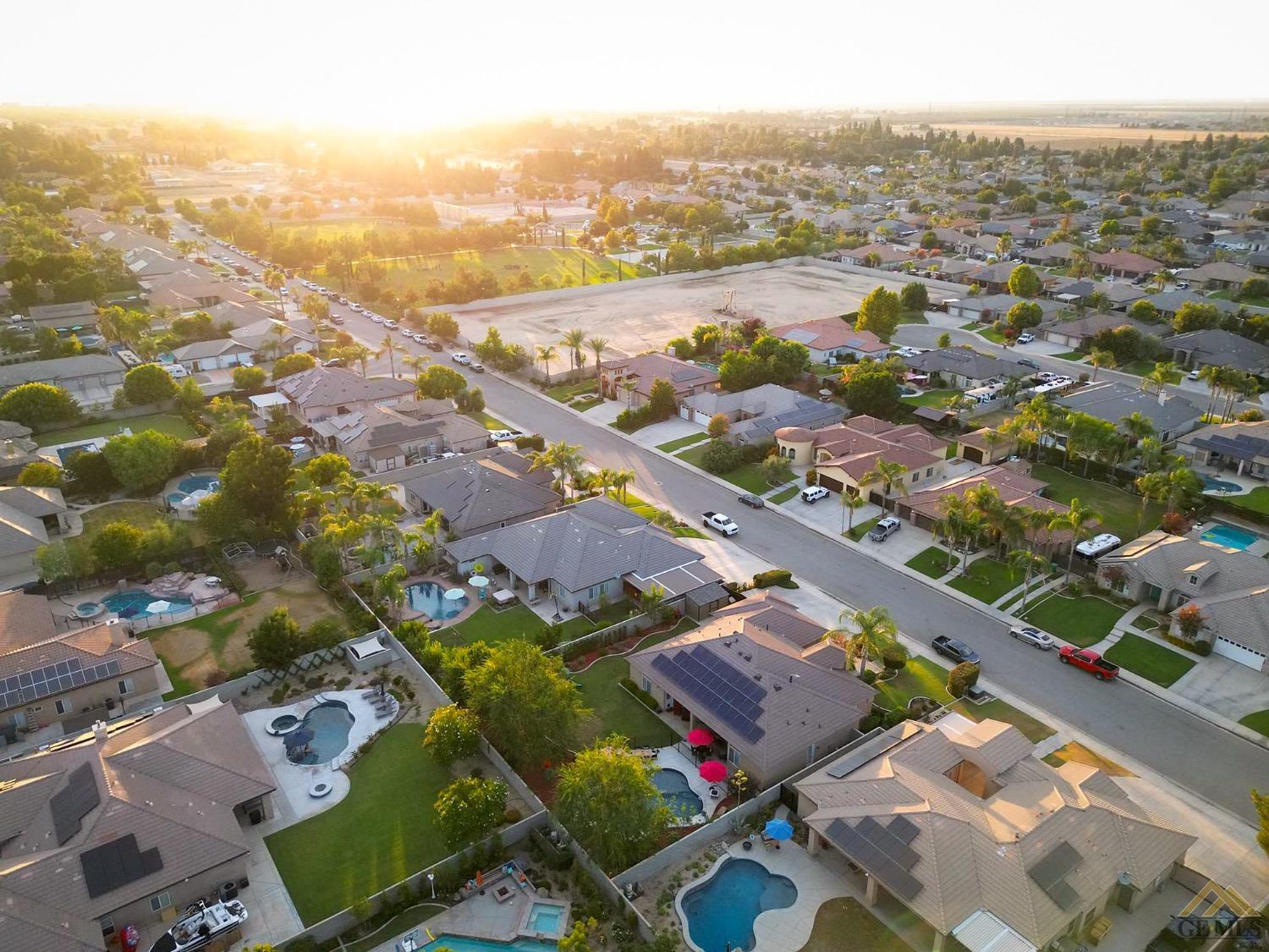 Undisclosed Address Bakersfield, CA 93314 - Photo 3 of 31 an aerial view of residential houses with outdoor space