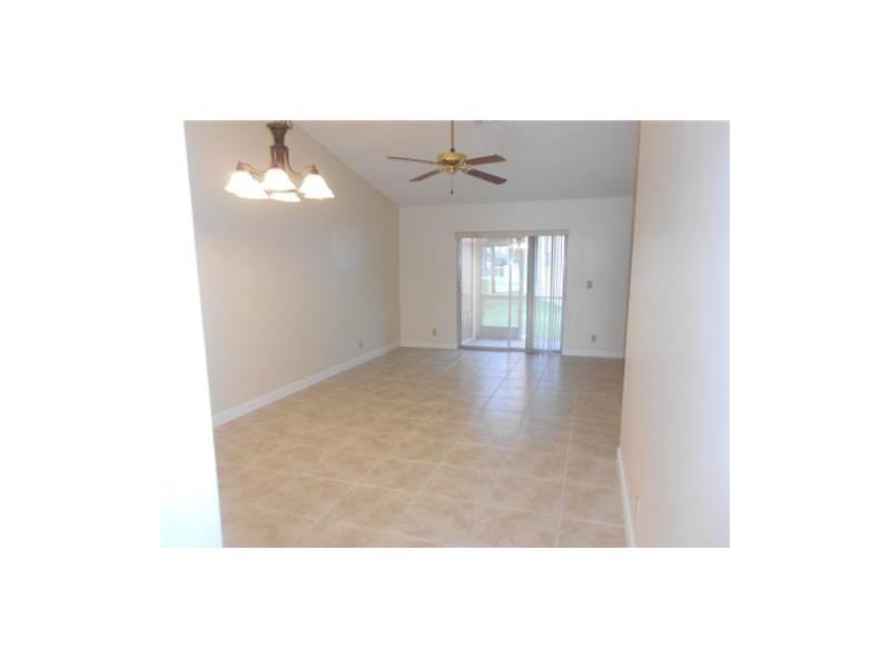 9853 Three Lakes Circle, Unit 2B Boca Raton, FL 33428 - Photo 3 of 6 ROSEWOOD LIVING ROOM