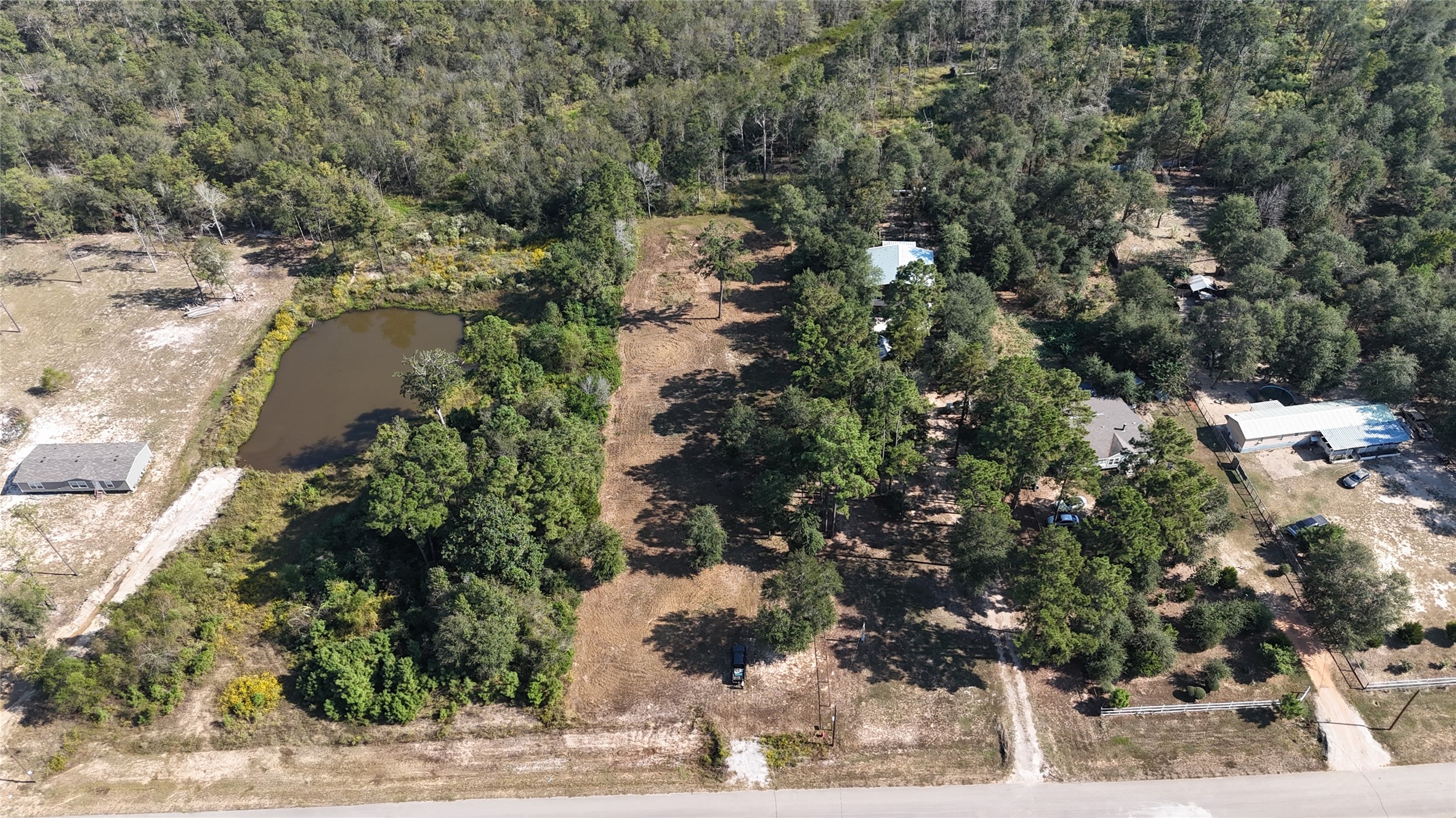417 County Road 3773 Cleveland, TX 77327 - Photo 4 of 11 a view of a lake view