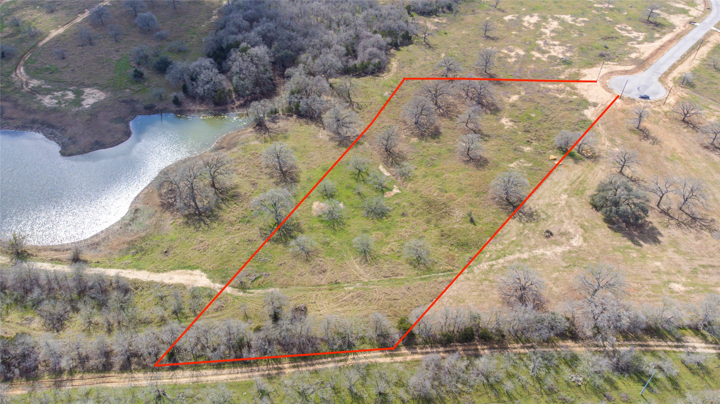 Tbd Tbd New Moon Court Red Rock, TX 78662 - Photo 4 of 19 a view of a wooden door