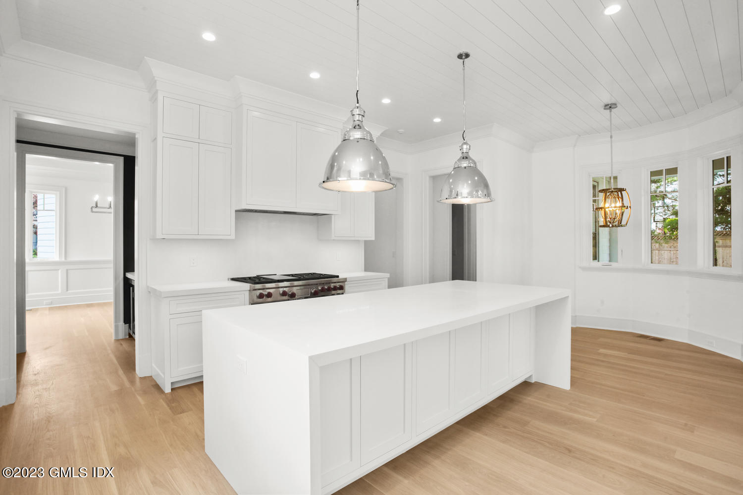 4 Ford Lane Old Greenwich, CT 06870 - Photo 11 of 43 a kitchen with stove and wooden floor