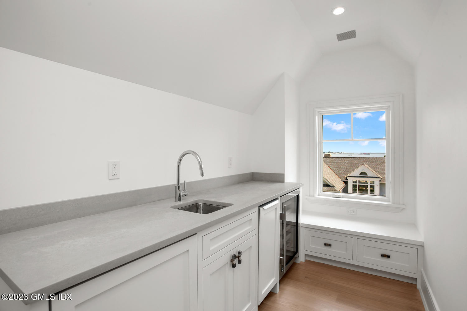 4 Ford Lane Old Greenwich, CT 06870 - Photo 23 of 43 a kitchen with cabinets and window