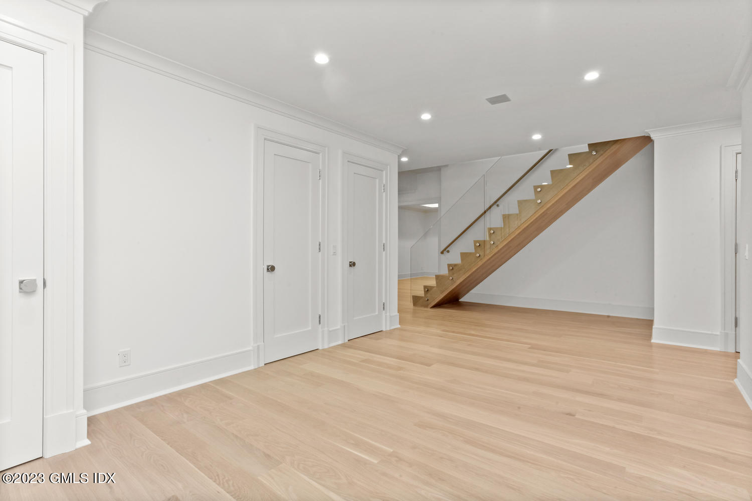 4 Ford Lane Old Greenwich, CT 06870 - Photo 26 of 43 a view of an empty room with wooden floor