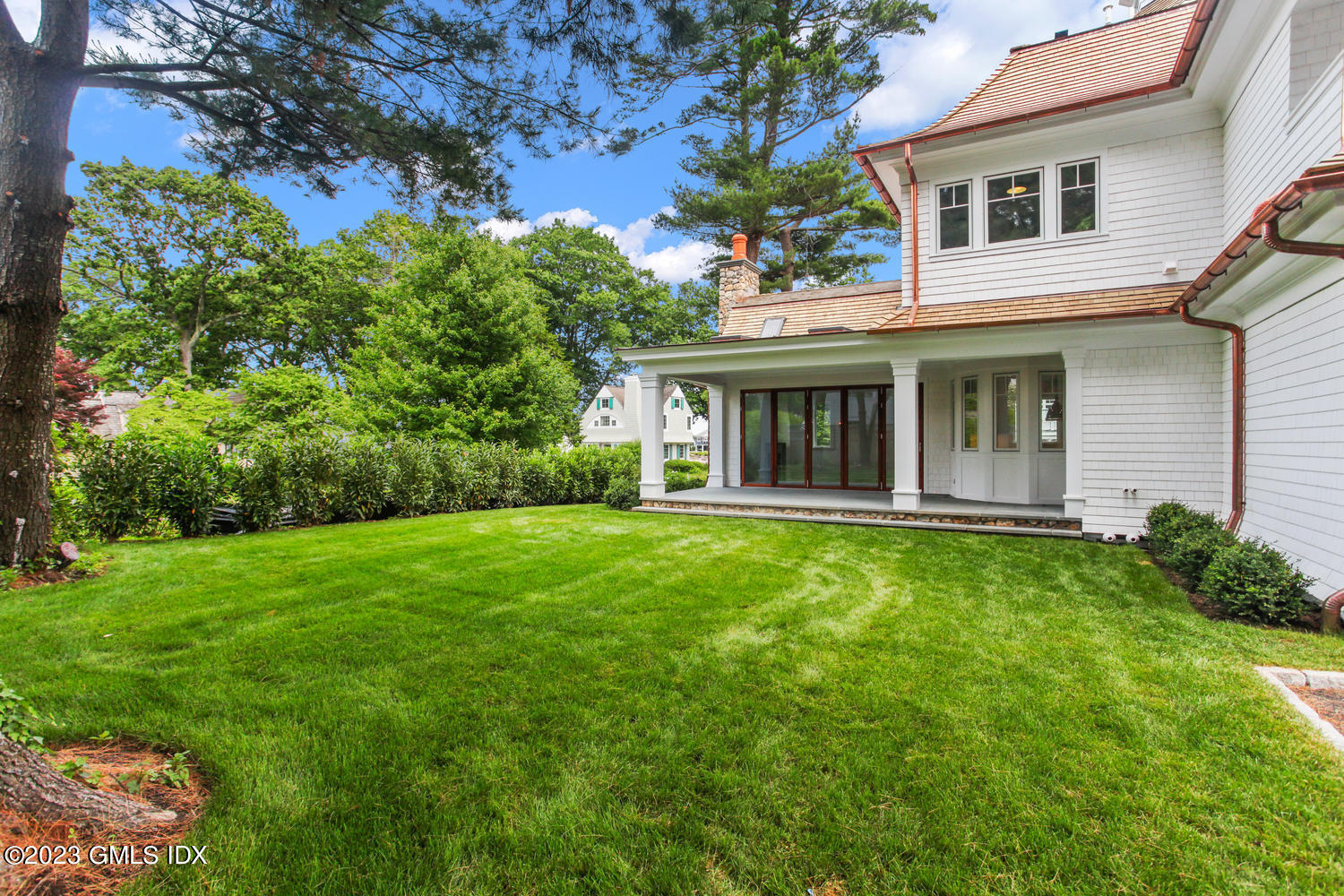 4 Ford Lane Old Greenwich, CT 06870 - Photo 36 of 43 a view of an house that has garden